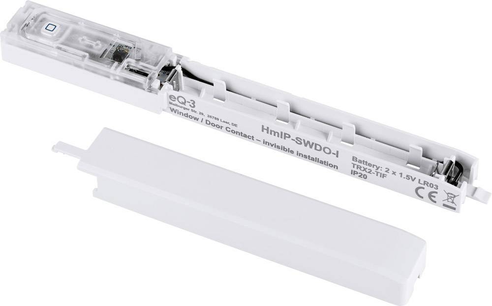 Ein weißer Tür-/Fensterkontakt von eQ-3, Modell HmIP-SWDO-I, mit abnehmbarer Abdeckung, dient der unsichtbaren Installation.