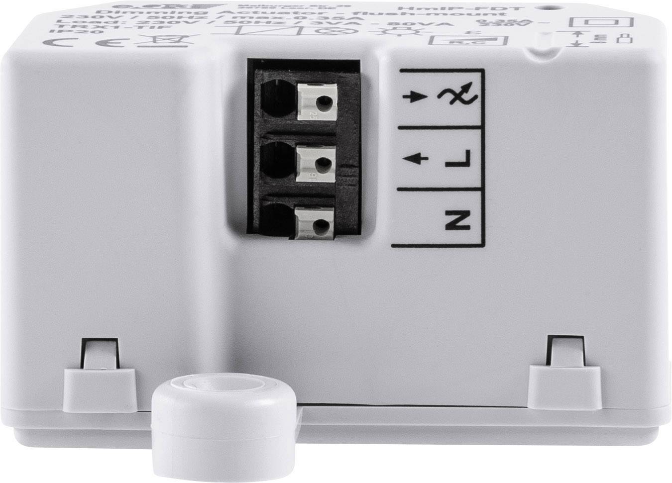 Ein weißes elektrisches Gerät mit drei Anschlussklemmen, beschriftet mit 'N', 'L' und 'X'. Oben sind technische Symbole gedruckt.