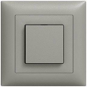 Ein grauer Lichtschalter an der Wand in Nahaufnahme; rechteckig mit quadratischer Betätigungstaste, schlichtes Design.
