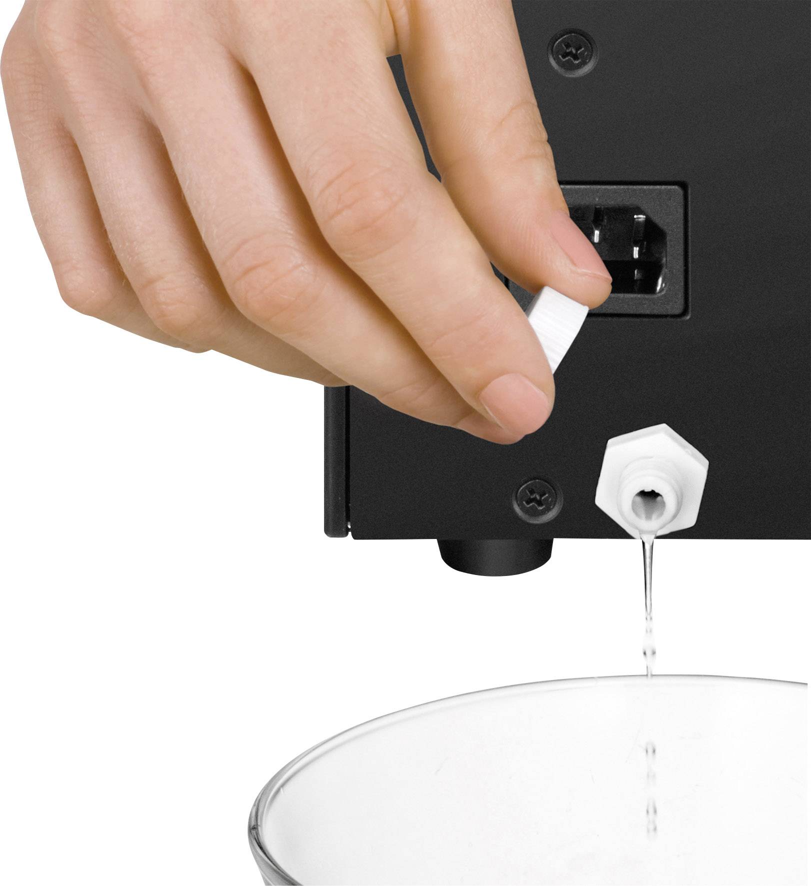 Eine Hand hält einen weißen Streifen unter einen Wassertropfen, der von einem schwarzen Gerät in eine Glasschale fällt.