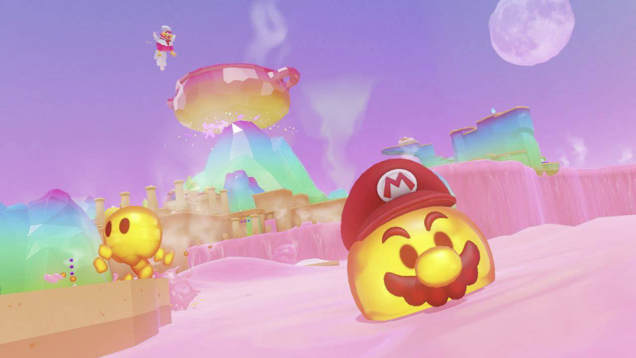 Eine bunte Fantasielandschaft mit Mario in einer Suppe aus Lava. Im Hintergrund schwebt eine Pfanne, während ein goldener Feind in der Nähe steht.