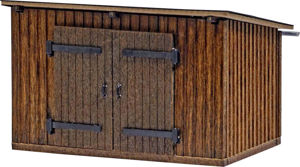 Ein kleiner Holzschuppen mit zwei Türen und schwarzen Beschlägen steht auf einem ebenen Untergrund.