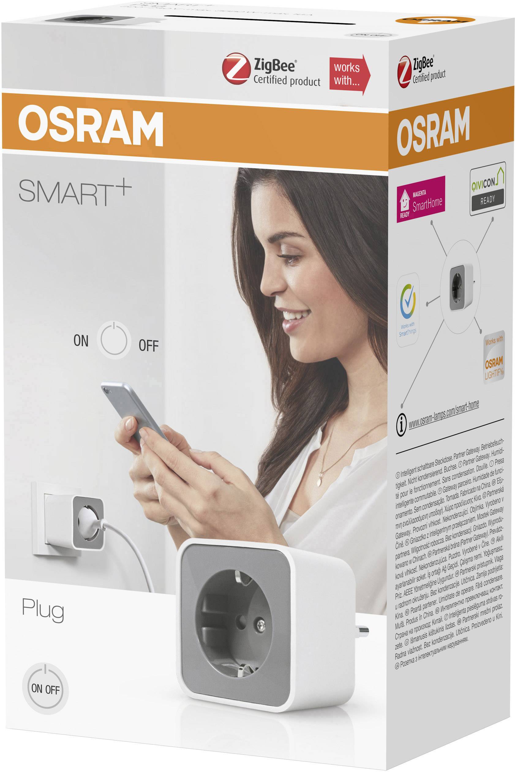 'OSRAM Smart+ Steckdose' Verpackung. Abgebildet ist eine Frau mit Smartphone, daneben eine Steckdose. Kompatibel mit ZigBee.