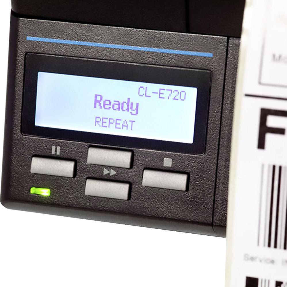 Ein Druckerdisplay zeigt 'Ready'. Daneben befinden sich Steuerungsknöpfe. Ein Barcode-Etikett ist teilweise sichtbar.