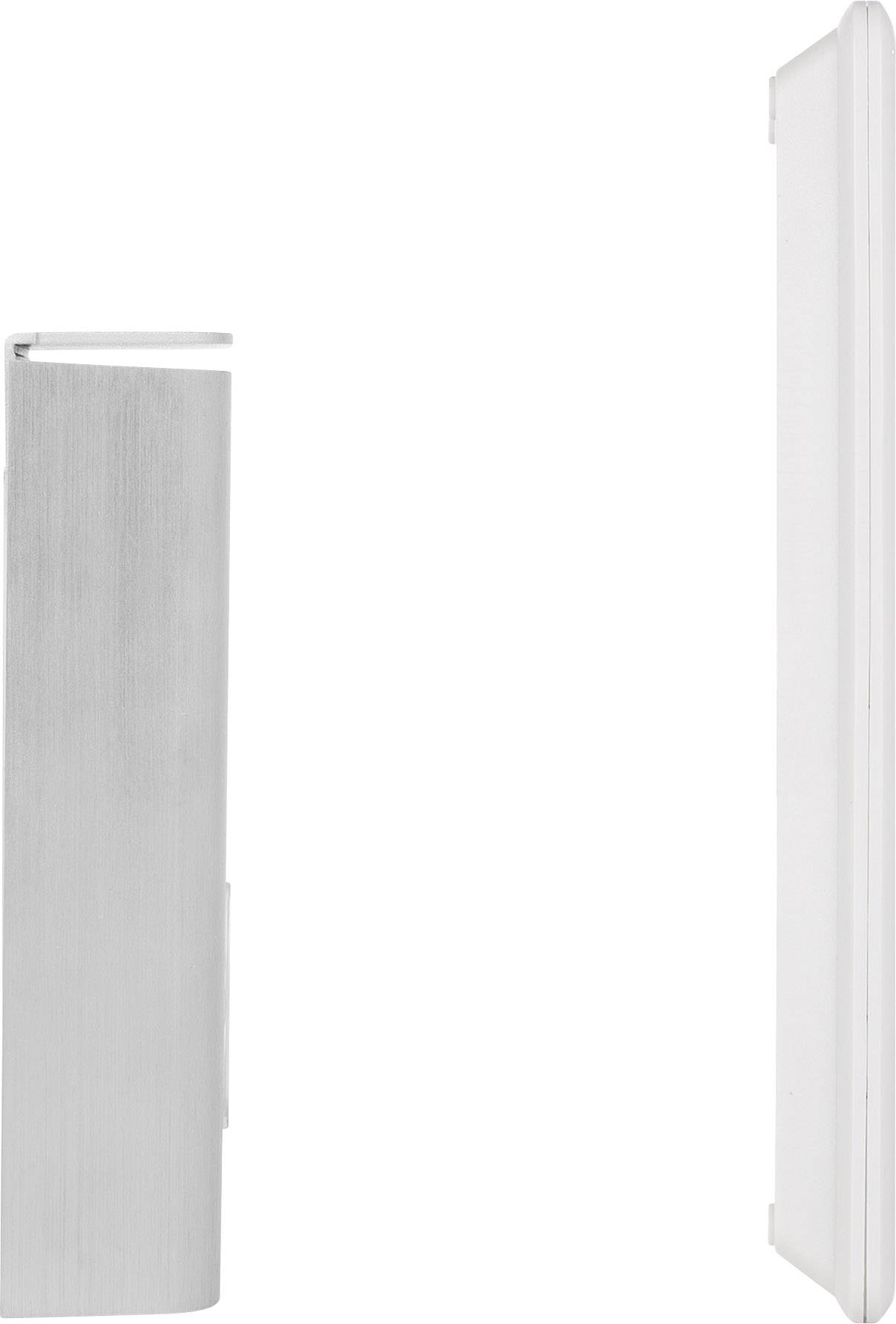 Ein silbernes, rechteckiges Objekt und ein weißes Objekt stehen vertikal nebeneinander, getrennt durch einen leeren Raum.