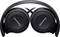 Schwarzer Over-Ear-Kopfhörer von Panasonic, zusammengeklappt. Sicht auf die Außenseite der Ohrmuscheln, Markenlogo sichtbar.