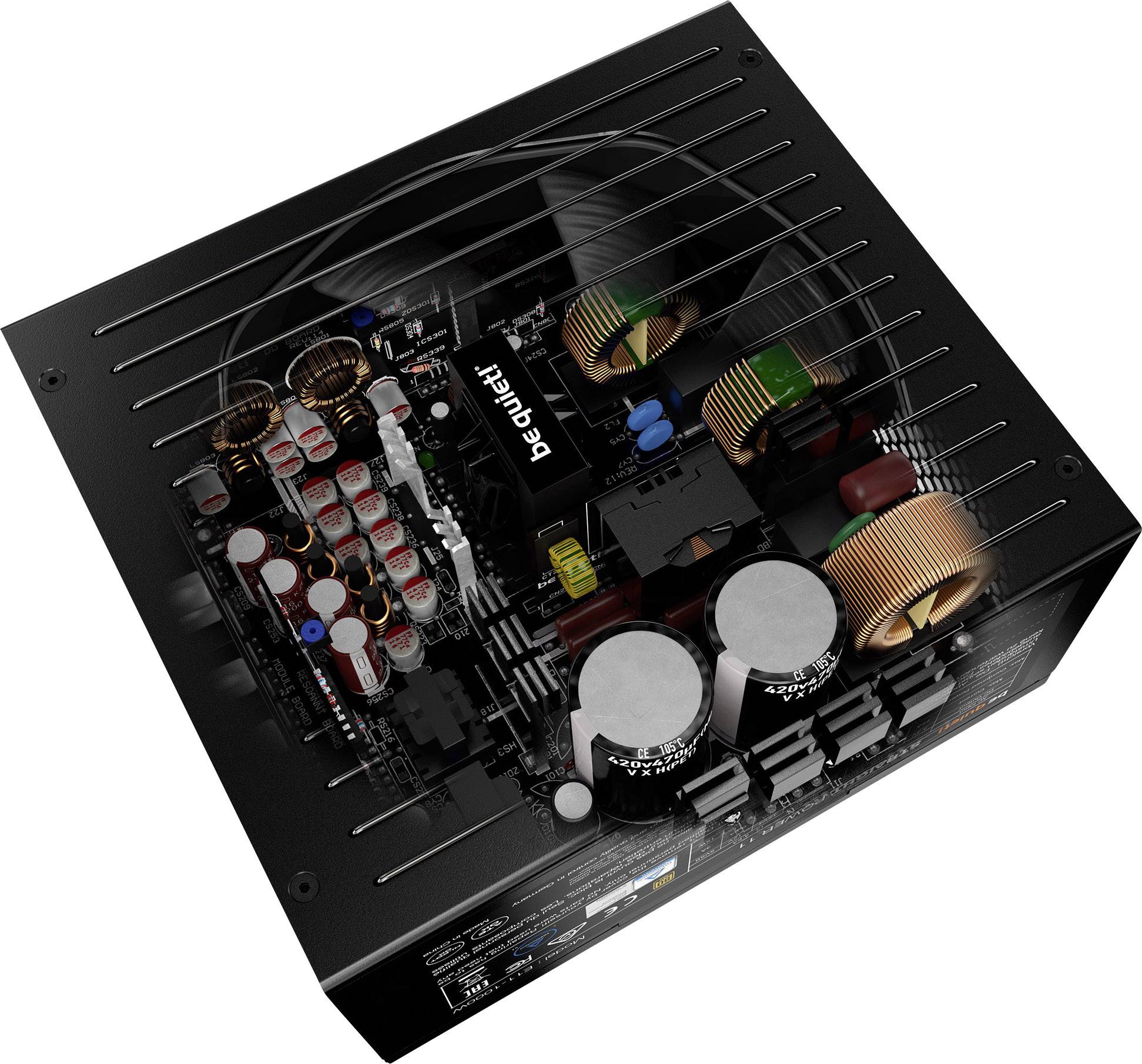 Das Bild zeigt das Innere eines technischen Geräts mit elektronischen Bauteilen wie Spulen, Kondensatoren und Leiterplatten.