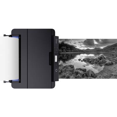 'Drucker mit Druckaufnahme', zeigt ein professioneller Drucker mit laufendem Druckprozess eines Schwarzweißfotos einer Landschaft.