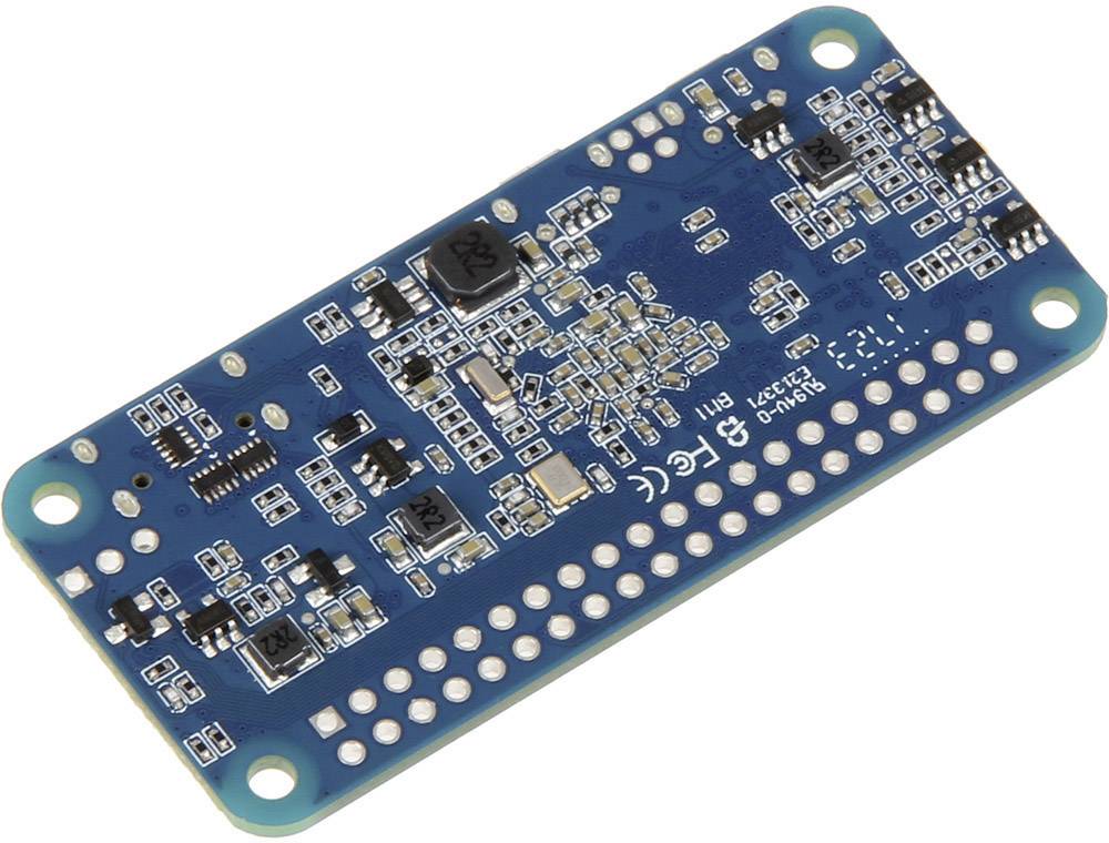 Eine blaue Leiterplatte mit verschiedenen elektronischen Komponenten, darunter Chips und Kondensatoren.