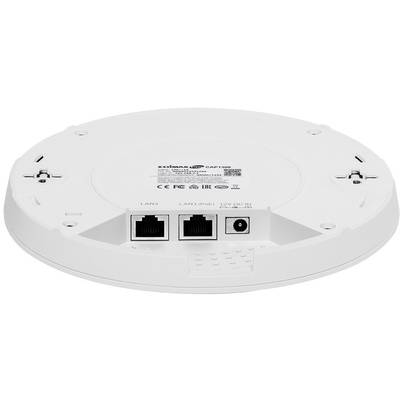 Rückseite eines runden WLAN-Access-Points mit zwei LAN-Anschlüssen und einer Stromanschlussbuchse, Etikett mit Modellinformationen.