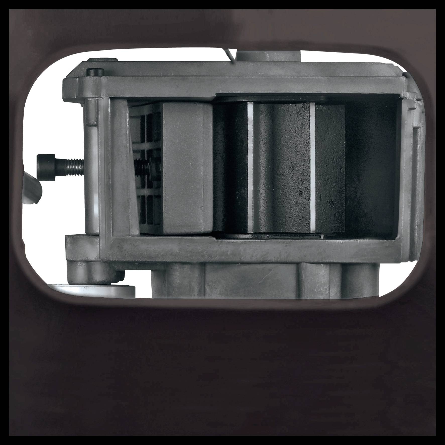 Eine detaillierte Nahaufnahme eines Metallmaschinenteils mit sichtbaren Schrauben und inneren Komponenten.