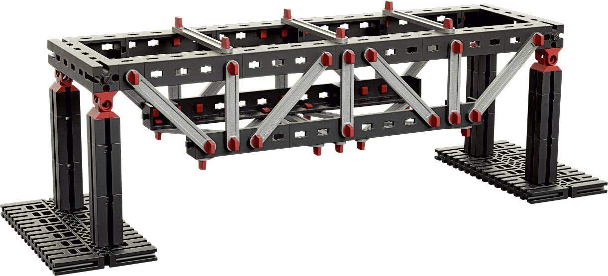 Eine schwarze fischertechnik Konstruktion mit roten und grauen Elementen, die eine Brücke mit Verstrebungen darstellt.