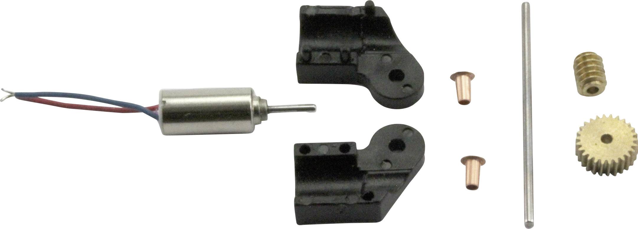 Kleiner Motor mit Zahnrädern und Befestigungsteilen, bestehend aus Metall und Kunststoff, für ein mechanisches Modell oder Gerät.