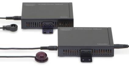 Zwei schwarze elektronische Geräte mit Kabelverbindungen und einem runden Sensor, wahrscheinlich für Datenübertragung.