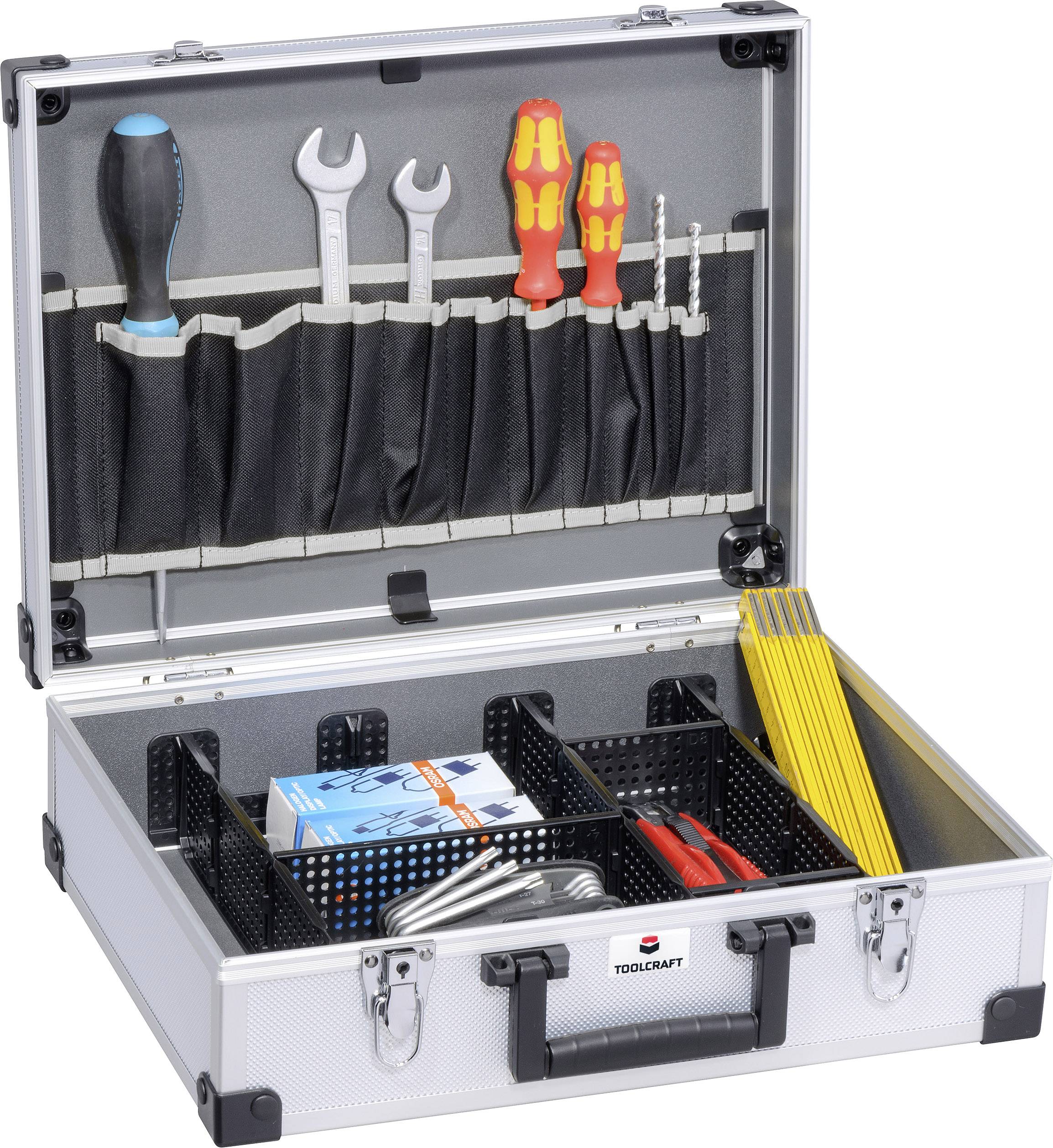 Ein geöffneter Werkzeugkoffer mit Schraubendrehern, Schraubenschlüsseln, Bohrern und gelben Dübeln. Compartments mit Kleinteilen.