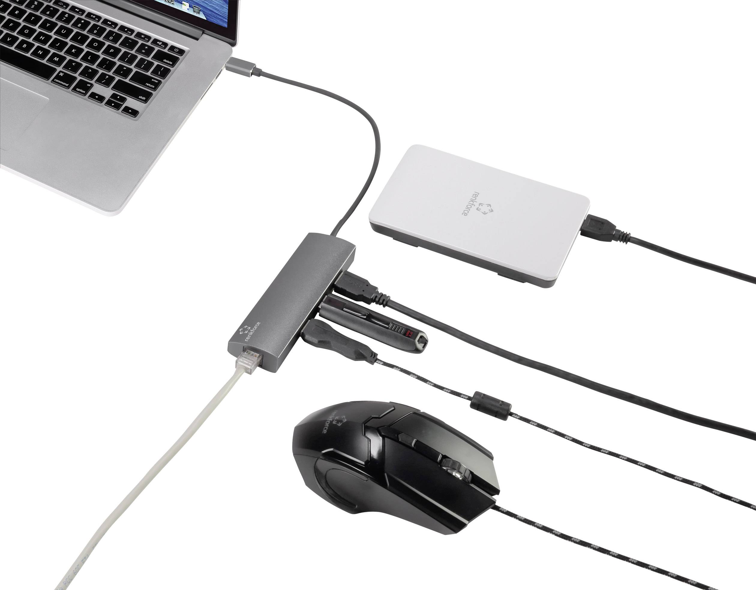 Laptop mit USB-Hub, an den eine externe Festplatte, eine Maus und ein weiteres USB-Gerät angeschlossen sind.
