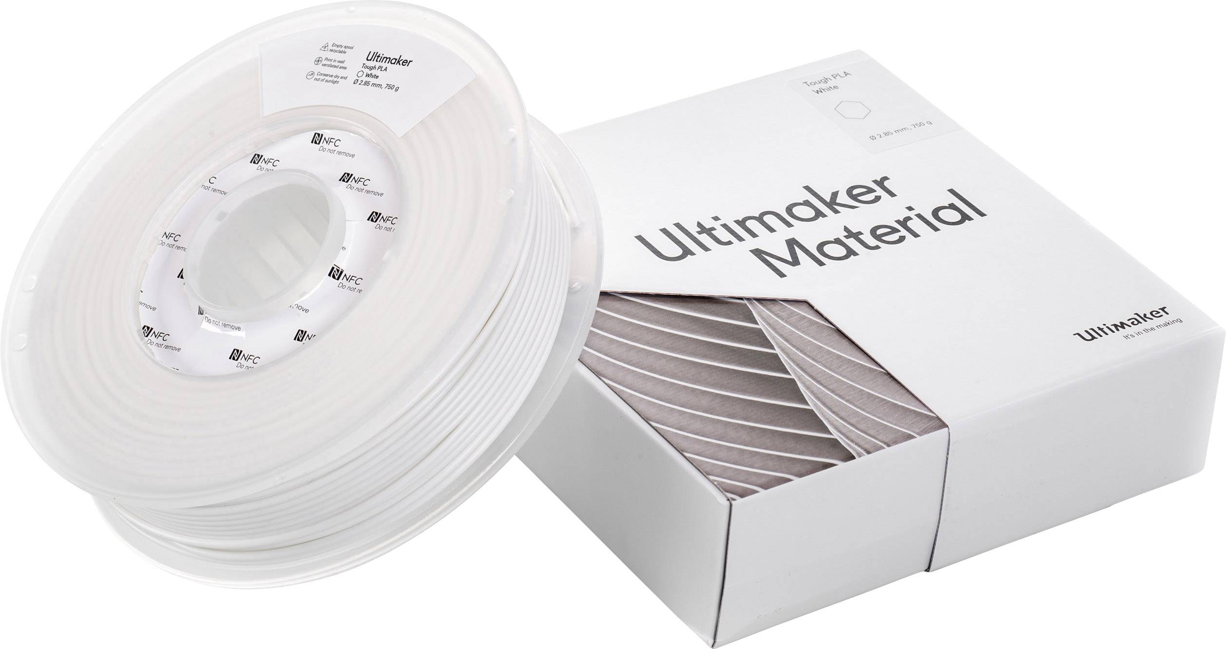 Die Abbildung zeigt eine Spule mit weißem 3D-Druckfilament von Ultimaker, daneben die passende Verpackung, die mit 'Ultimaker Material' beschriftet ist.