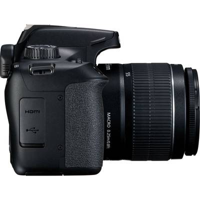 Digitalkamera von der Seite mit Zoomobjektiv und sichtbaren Bedienelementen, USB- und HDMI-Anschlüssen.