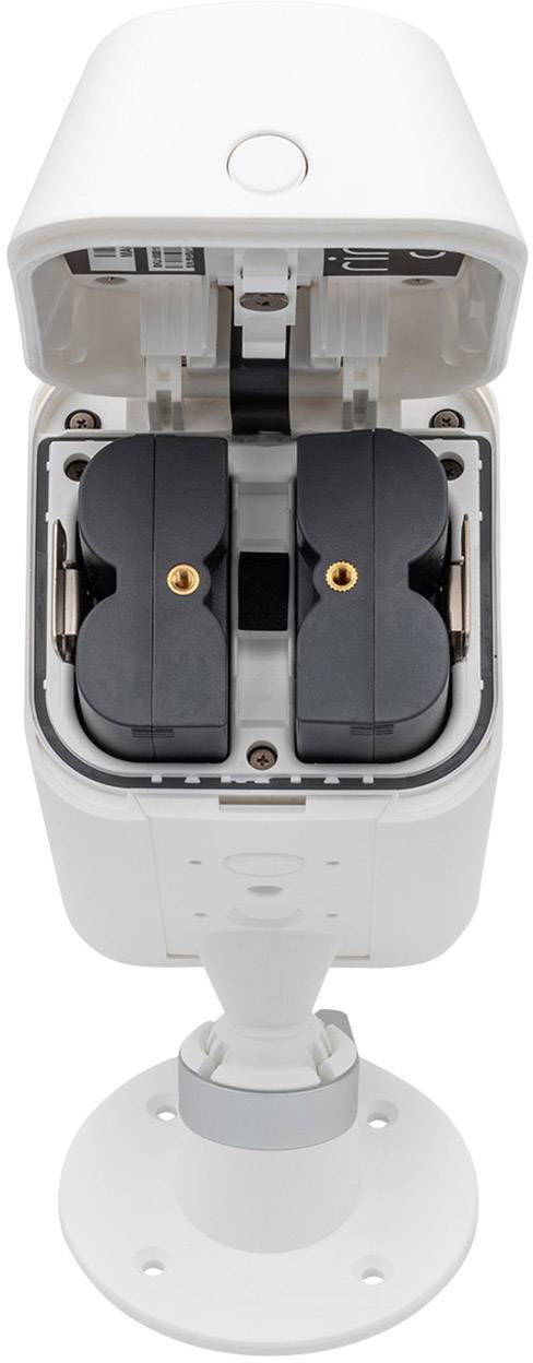 Überwachungskamera von oben geöffnet, Batteriefächer sichtbar. Gehäuse weiß, auf Sockel montiert.
