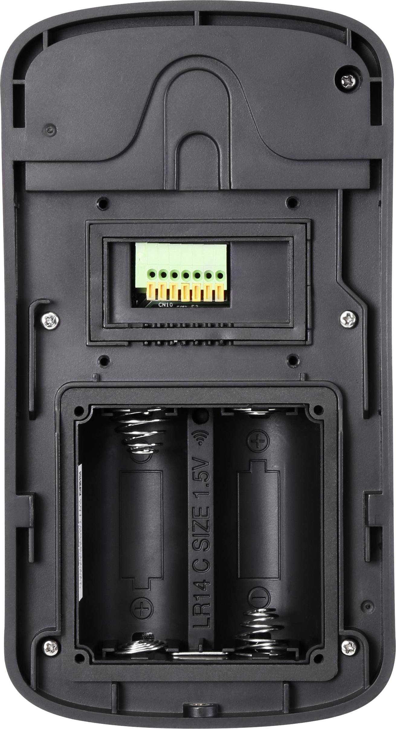 'Gehäuseinnenseite eines elektronischen Geräts mit Batterie- und Anschlussfach für 9-Volt-Batterien, ohne eingesetzte Batterien.'