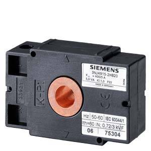 Schwarzer elektrischer Sicherungsblock mit orangefarbenem, rundem Einsatz und Etikett mit technischen Spezifikationen.
