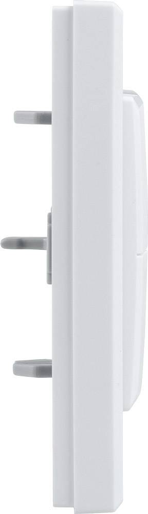 Seitenansicht eines weißen Steckers mit drei Metallstiften, die aus der flachen Oberfläche herausragen.