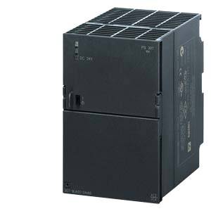 Schwarzes elektronisches Gerät im rechteckigen Gehäuse, vermutlich eine Steuerungseinheit oder ein Netzteil, mit mehreren Anschlüssen.