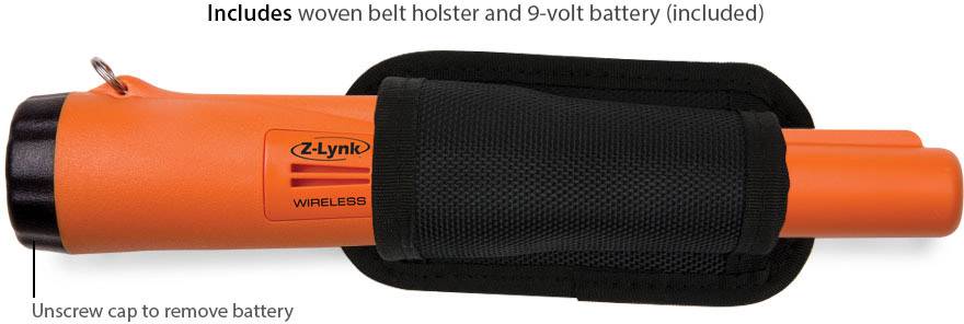 Ein rotes Gerät mit Batteriefach, verpackt in einem schwarzen Gürtelholster. Text: 'Includes woven belt holster and 9-volt battery (included)'.
