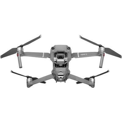 Eine graue Drohne im Flug mit ausgebreiteten Rotoren, Ansicht von unten.