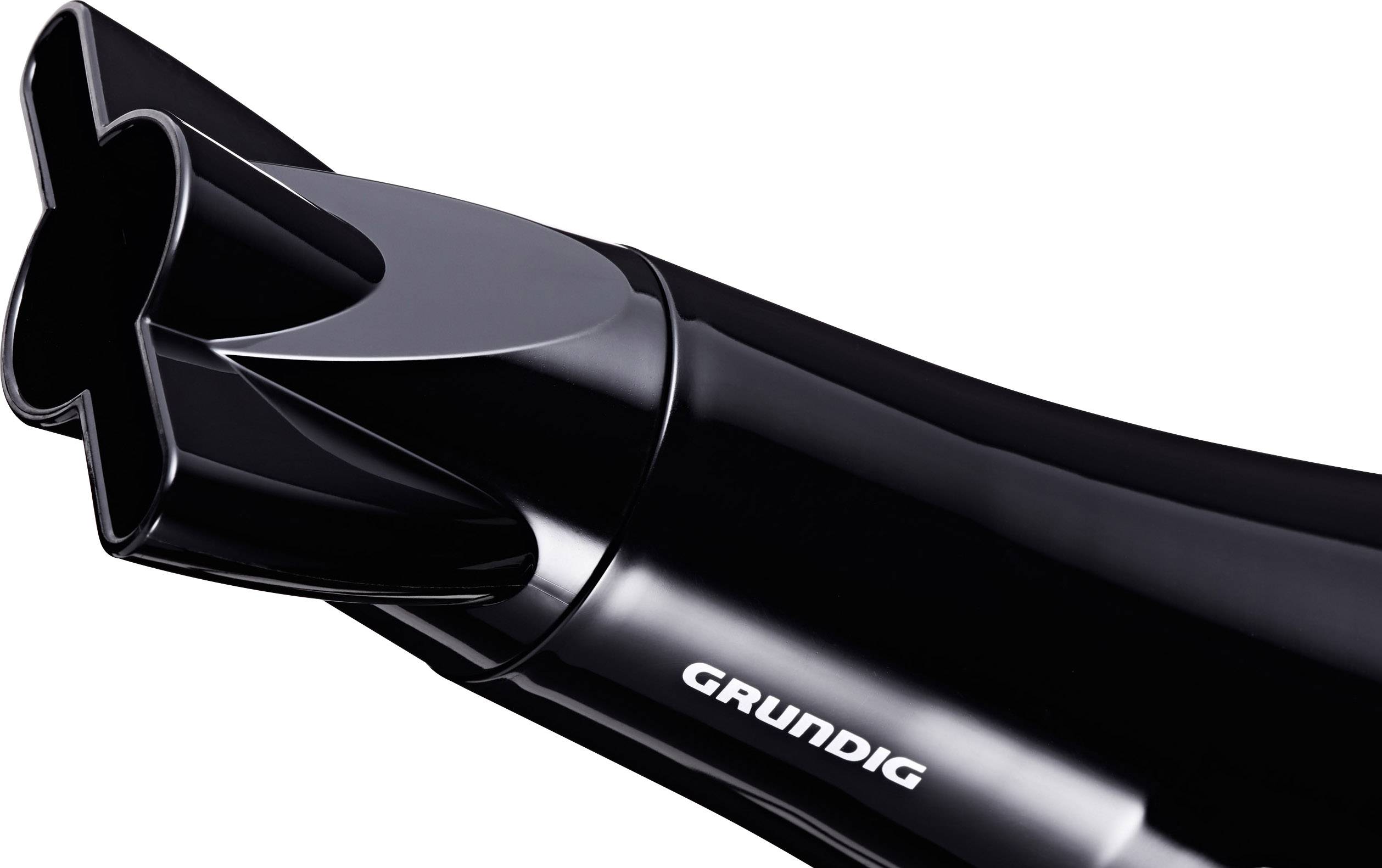 Ein schwarzer Haartrockner der Marke Grundig, fokussiert auf die Düse.