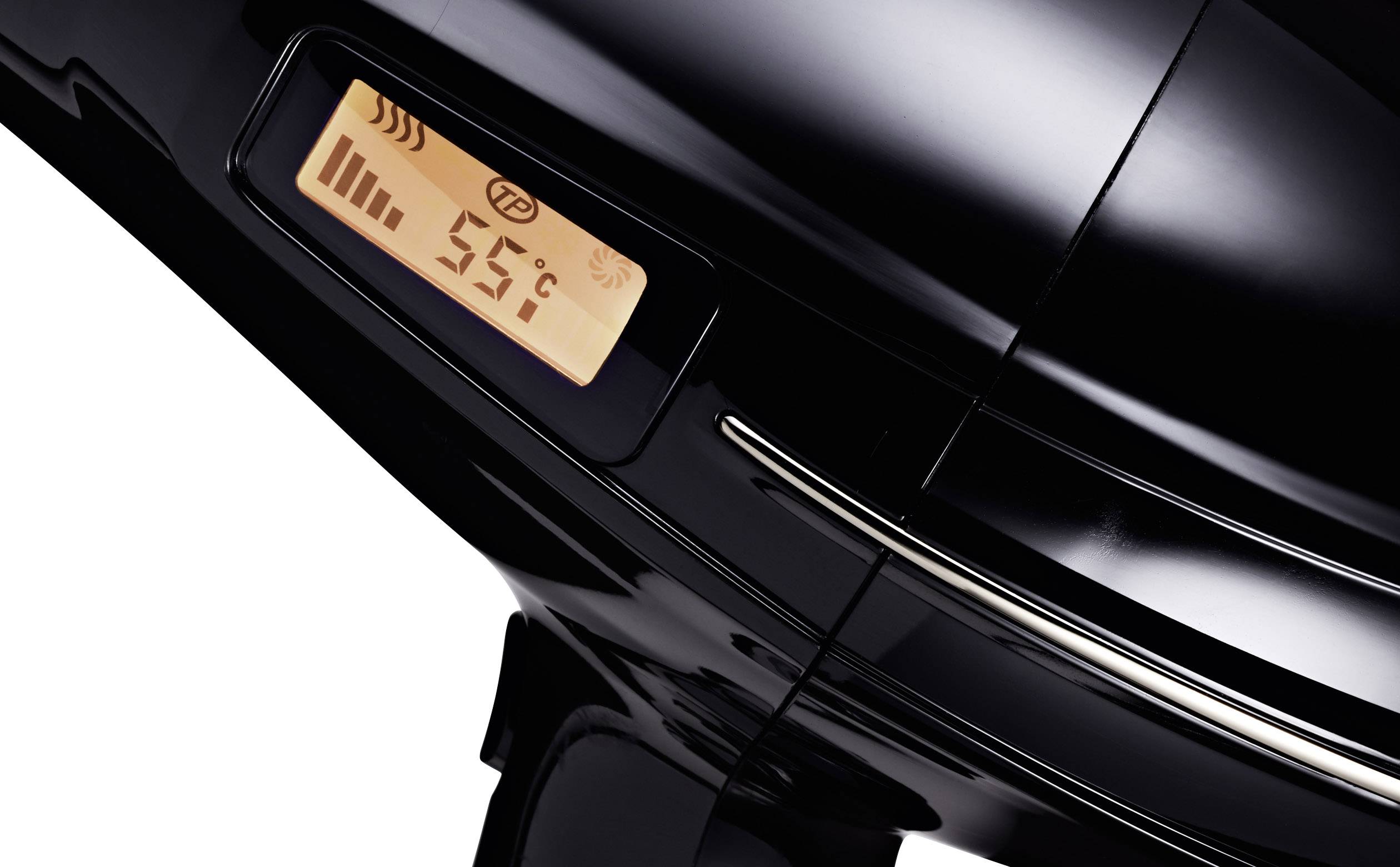 Schwarzer Haartrockner mit Digitalanzeige zeigt '55°C'.