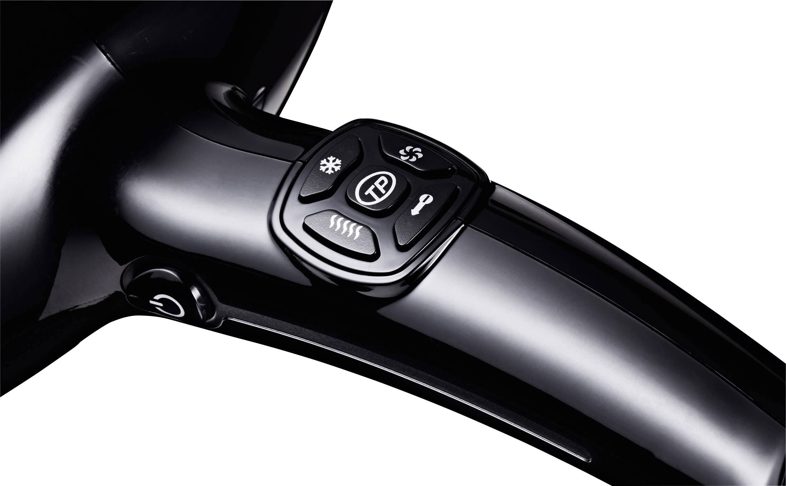 Nahaufnahme eines schwarzen Haartrockners mit vier Funktionstasten. Tasten sind mit Symbolen für Kaltluft, Turbomodus, Wärme und Strom markiert.