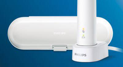 Elektrische Zahnbürste mit Ladegerät und Reinigungsbox. Marke: Philips. Set auf blauem Hintergrund.