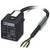 Ein schwarzes elektrisches Gerät mit Kabel und Aufdruck 'Phoenix Contact'. Es zeigt ein Schaltbild, hat 24V Eingang und 4A Ausgang.