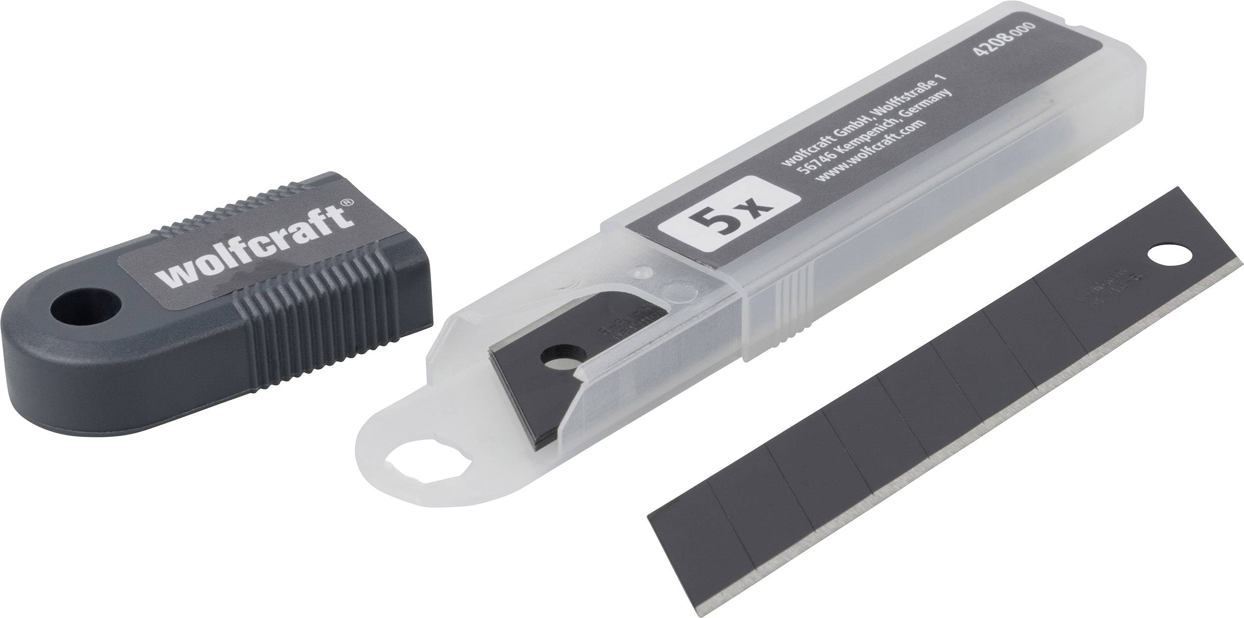 Kunststoffbox mit fünf Cutter-Ersatzklingen von Wolfcraft, daneben Kappenaufsatz. Verpackung mit Firmenlogo und Anzahl der Klingen.