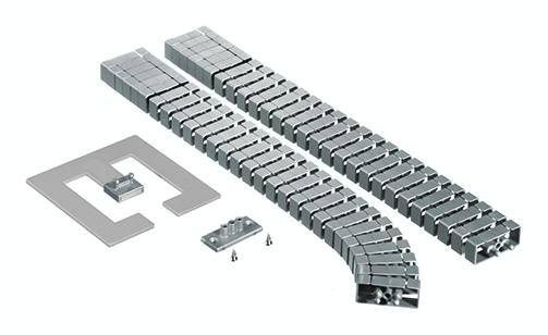 Magnetisches Auswuchtgewicht-Set mit selbstklebenden, rechteckigen Gewichten, platziert neben Montagematerial und einer Auflegeplatte.