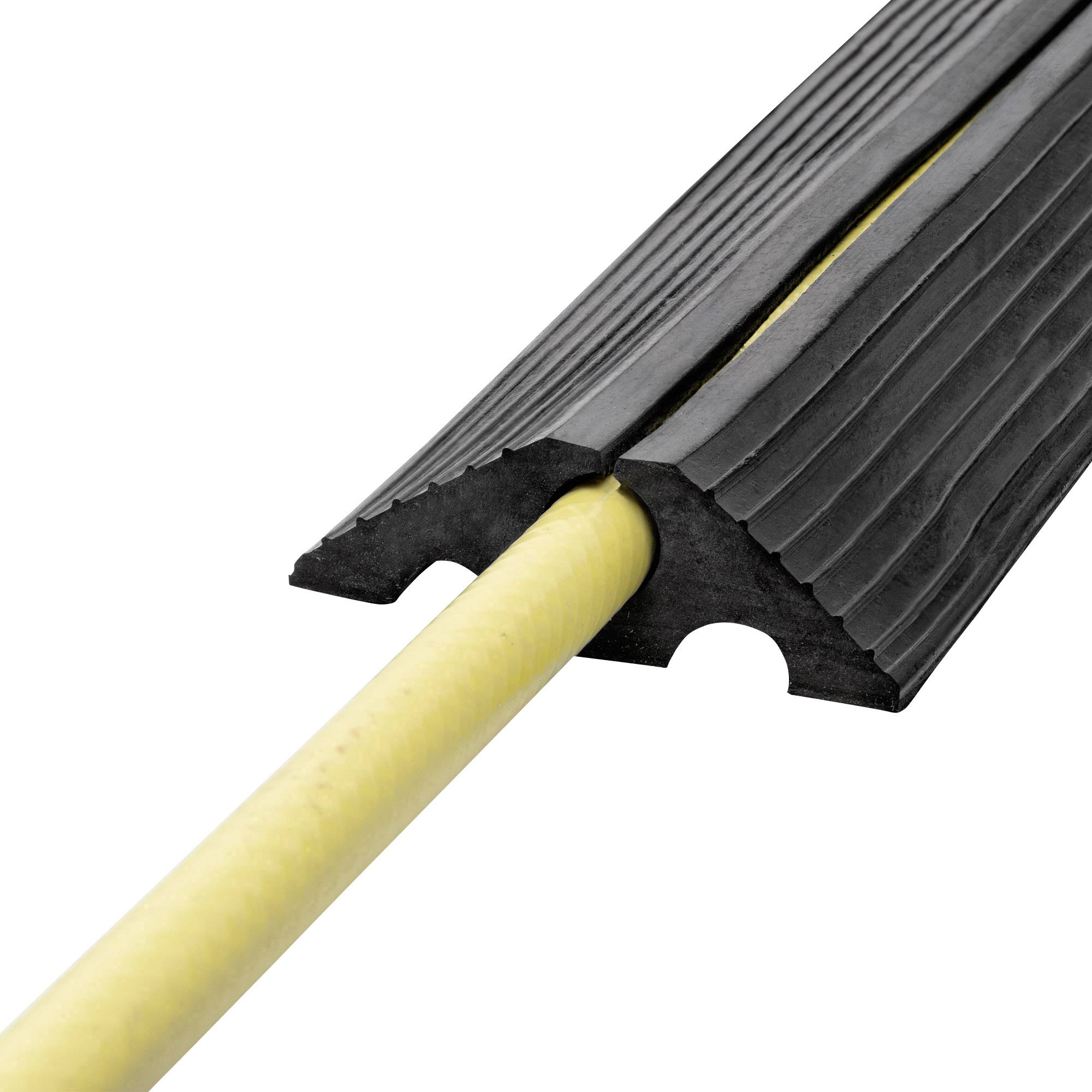 Kabelschutzbrücke aus Gummi über einem gelben Kabel. Ermöglicht sicheres Überfahren ohne das Kabel zu beschädigen.