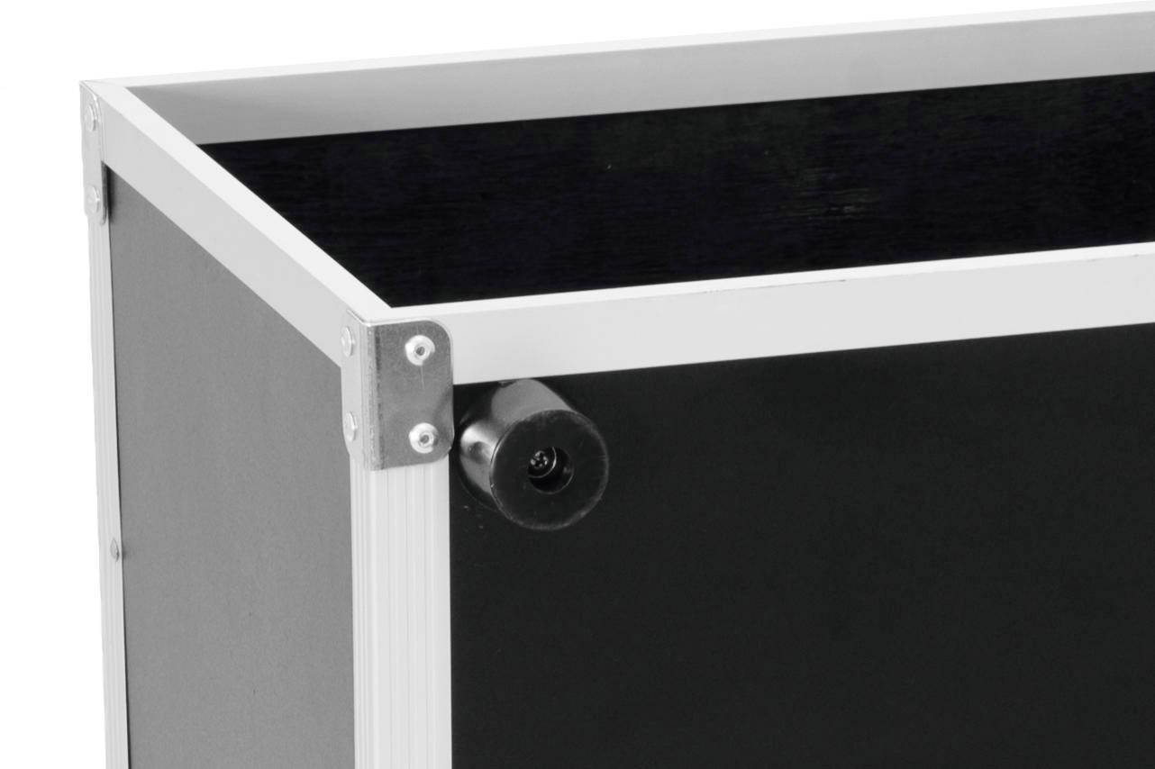 Ein schwarzer, rechteckiger Kasten mit silbernem Rahmen und einer kleinen Rolle an der unteren Ecke, vermutlich für Mobilität.