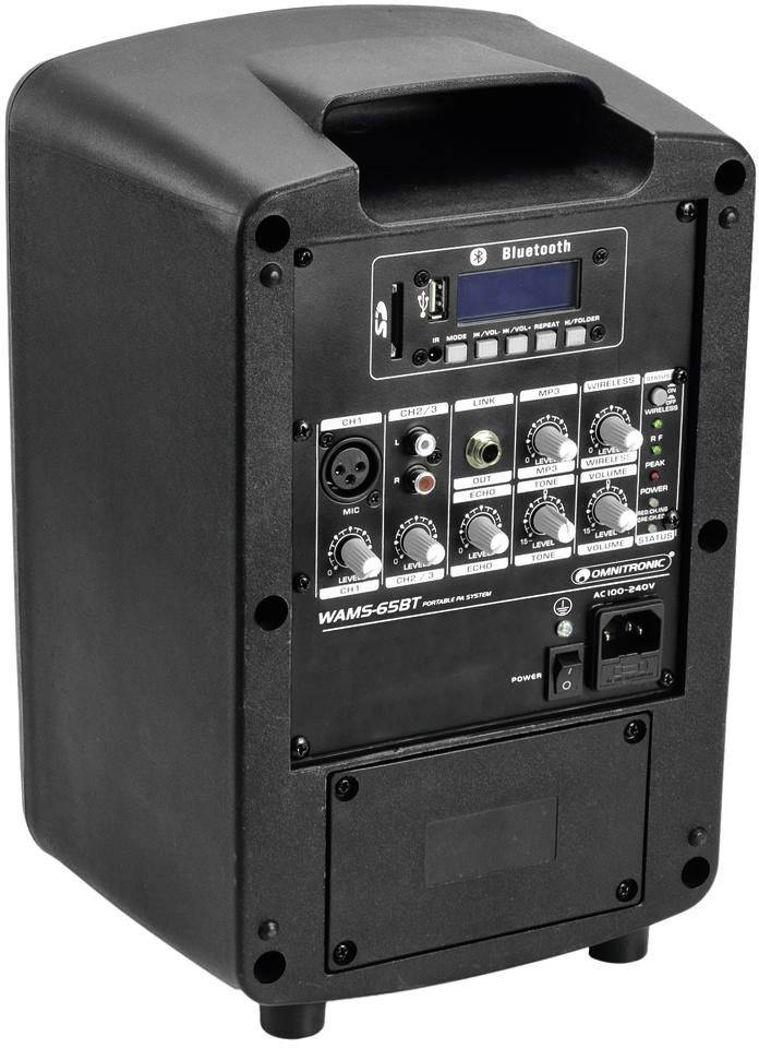 Ein tragbarer Lautsprecher mit Bedienelementen und Anschlüssen, darunter Bluetooth, Lautstärkeregler und Anschlussbuchsen.