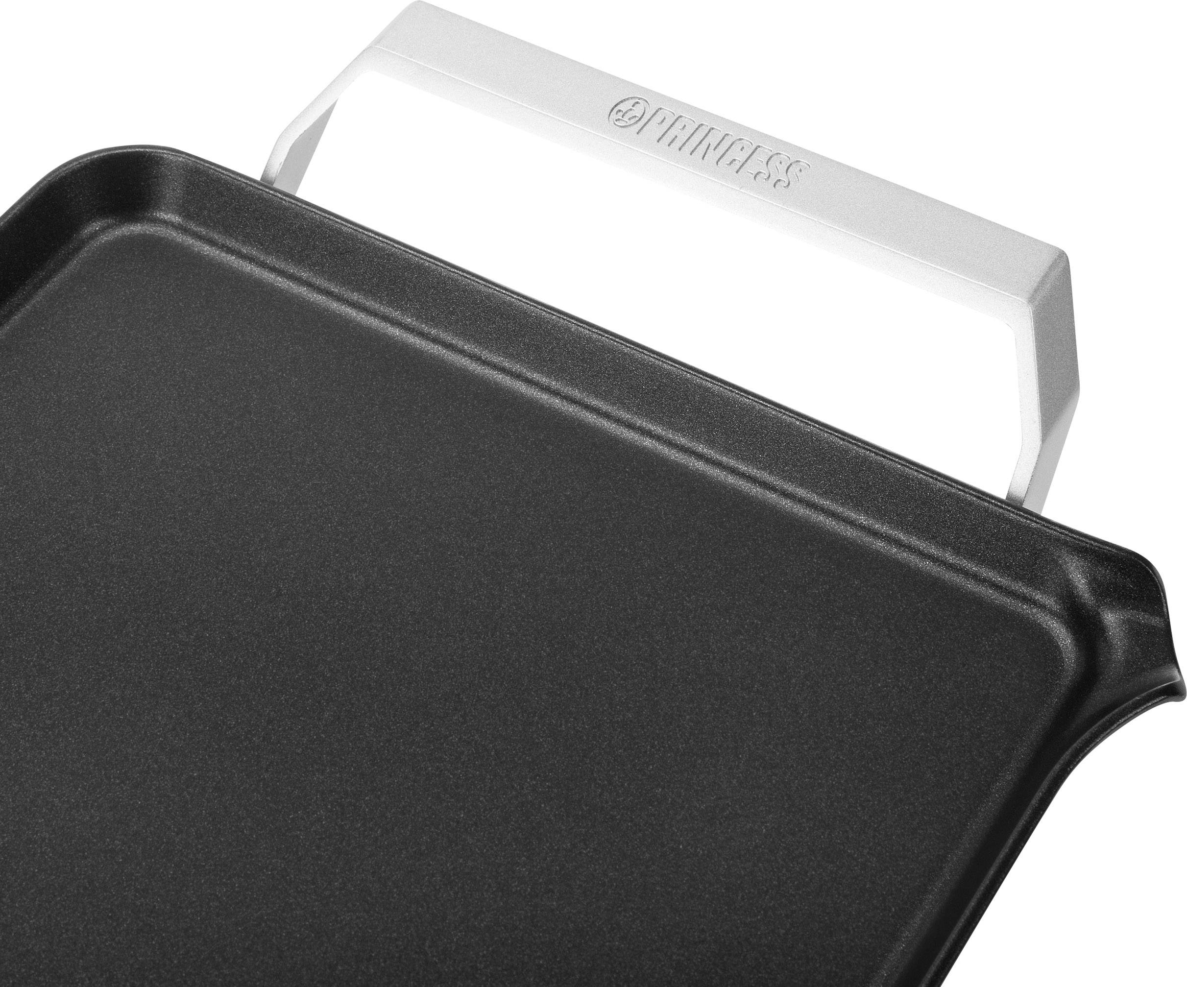 Schwarze Grillplatte mit silbernem, integrierten Griff, rechteckige Form, dient zum Kochen oder Grillen.