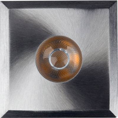 Ein runder, orangefarbener Knopf in einem quadratischen, silbernen Metallrahmen.