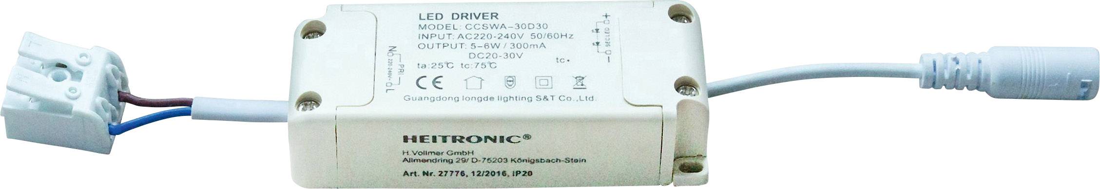 Ein rechteckiger LED-Treiber mit technischen Spezifikationen aufgedruckt; Anschlüsse und Kabel für Stromversorgung sichtbar.