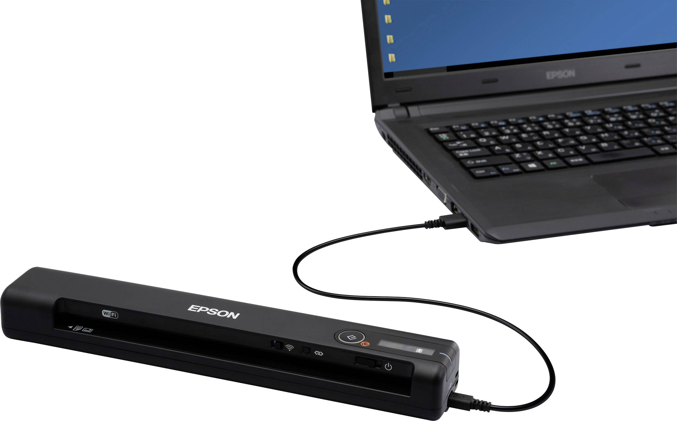 Ein tragbarer Epson-Scanner ist mit einem Laptop verbunden und wird verwendet, um Dokumente zu digitalisieren. Der Scanner liegt vor dem Laptop.