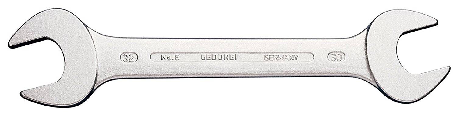 Ein silberner Doppelschlüssel, Größe '32' und '30', mit der Aufschrift 'GEDORE'. Hauptsächlich zum Festziehen oder Lösen von Muttern und Schrauben verwendet.