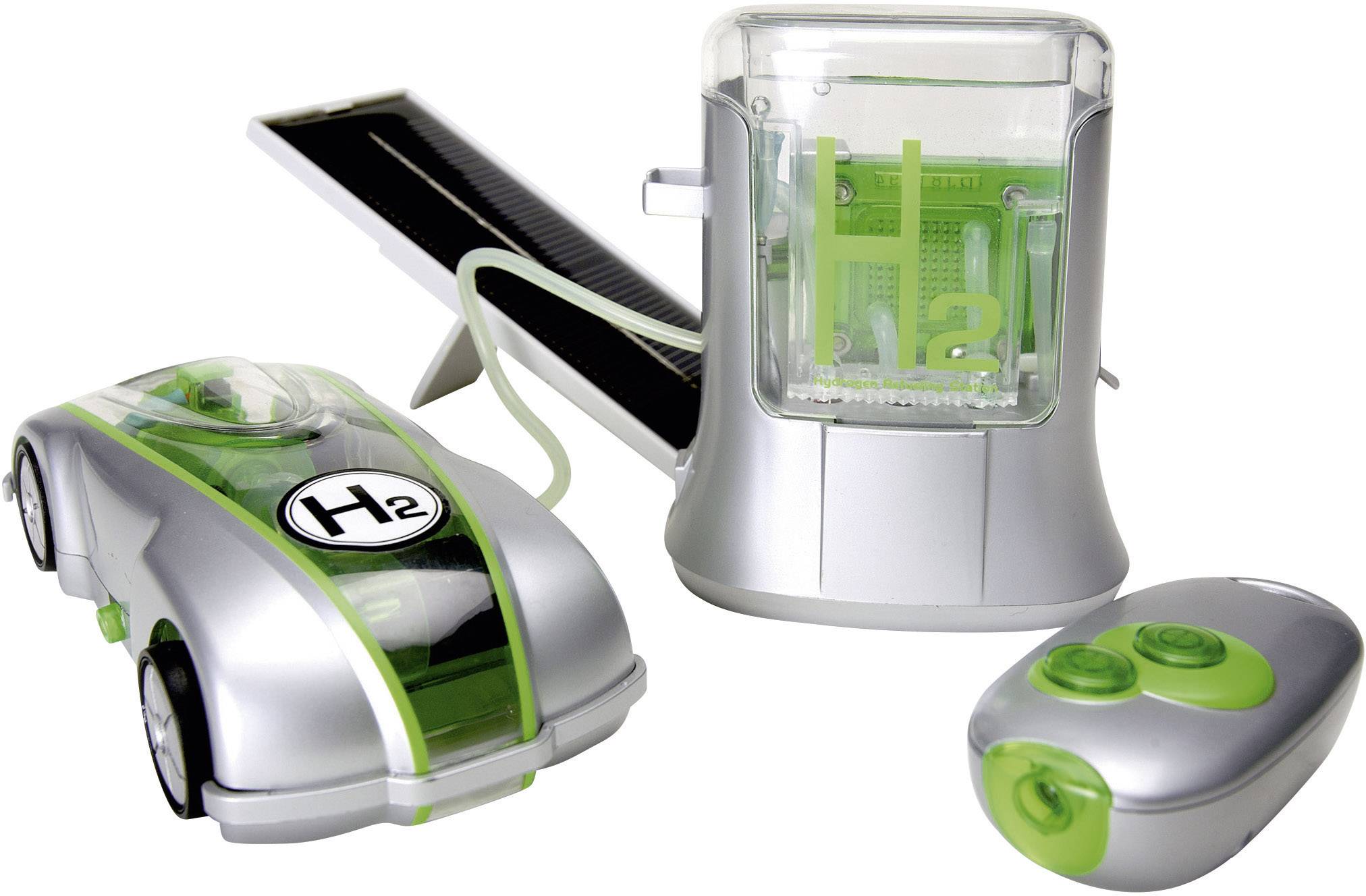 Ein Spielzeugauto mit Wasserstoffmodul und Solarpanel, begleitet von einer kleinen Fernbedienung.