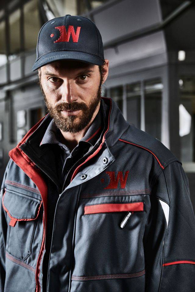 Workwear Softshell Jacket - COLOR - Funktionelle Softshelljacke mit hochwertiger Ausstattung schwarz/grün, Gr. 5XL-4