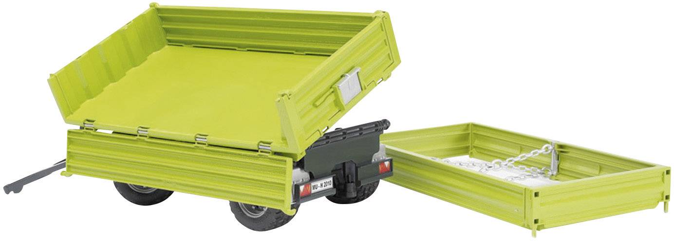 Ein grüner Modellanhänger mit abnehmbarer Ladefläche und Ketten. Der Anhänger hat zwei Räder und eine Anhängerkupplung.