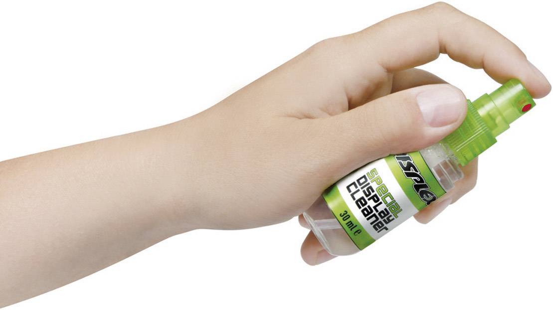 Eine Hand hält ein kleines, grünes Sprayfläschchen und sprüht daraus. Auf dem Etikett steht 'Faber-Castell'.