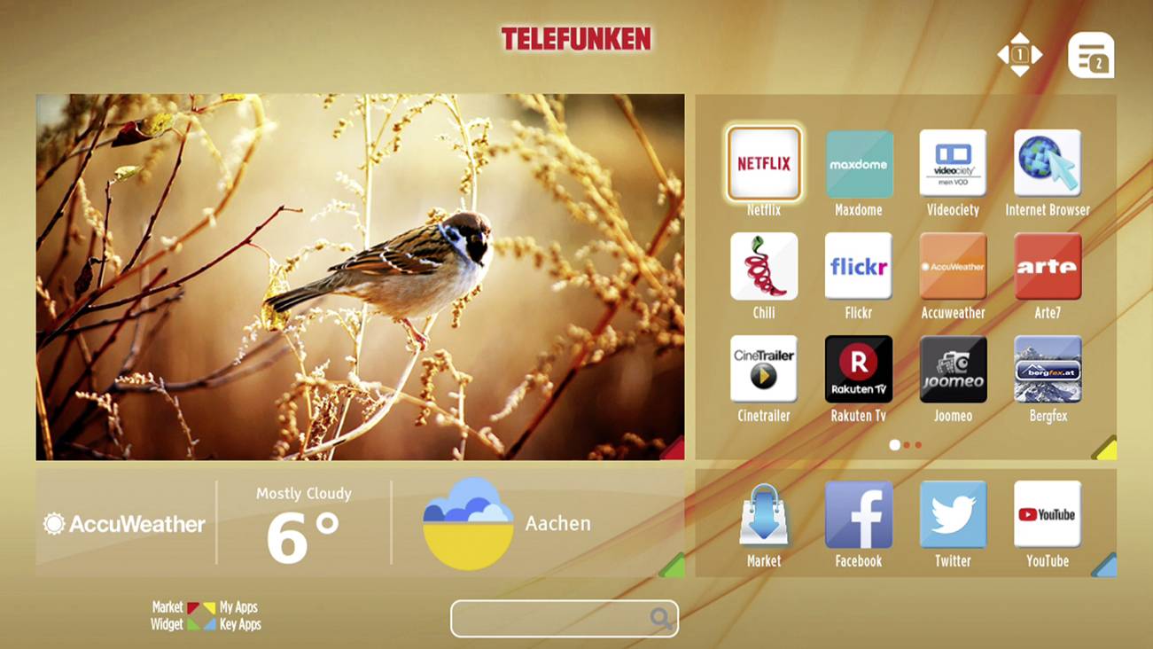 Smart-TV-Bildschirm zeigt Wetterinfo für Aachen (6°C, meist bewölkt) und App-Icons inklusive Netflix, YouTube, Arte und Facebook.