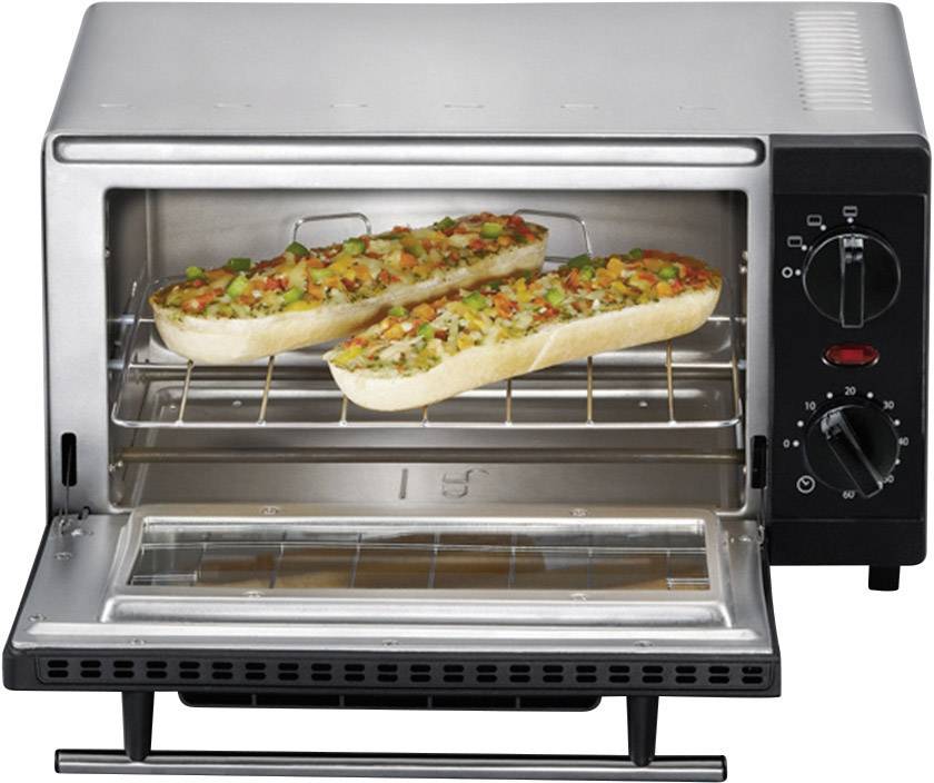 Ein Toasterofen mit zwei belegten Baguettescheiben, die mit Gemüse überbacken sind. Temperatur- und Zeitschalter sind sichtbar.